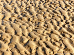 Natural patterns in the sand on the beach