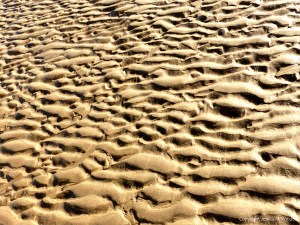 Natural patterns in the sand on the beach