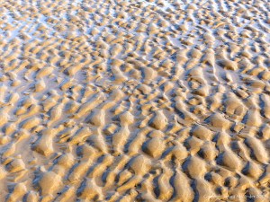Natural patterns in the sand on the beach