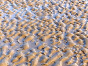 Natural patterns in the sand on the beach