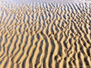Natural patterns in the sand on the beach