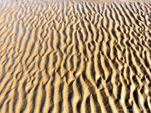 Natural patterns in the sand on the beach
