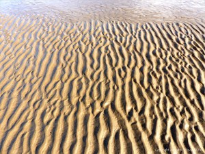 Natural patterns in the sand on the beach