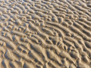 Natural patterns in the sand on the beach