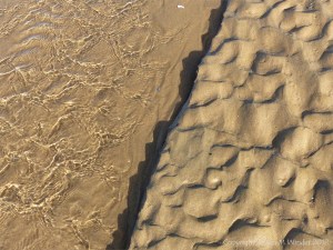 Natural patterns in the sand on the beach