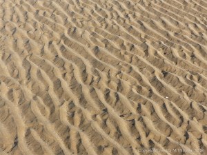 Natural patterns in the sand on the beach