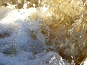 A torrent of water flowing in a Cornish stream