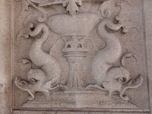 Stone carvings of dolphins
