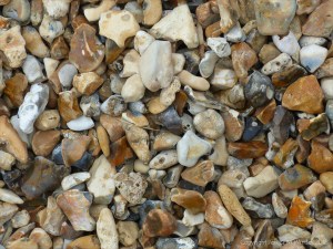 Beach stones with natural holes