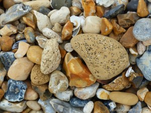 Beach stones with natural holes
