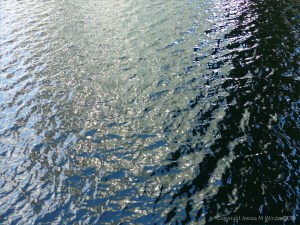 Rippled water with reflected light patterns