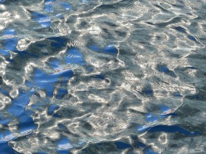 Rippled water with reflected light patterns