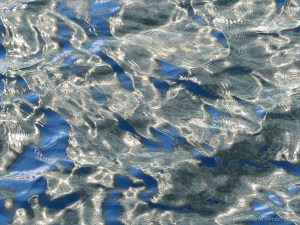 Rippled water with reflected light patterns