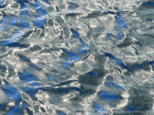 Rippled water with reflected light patterns