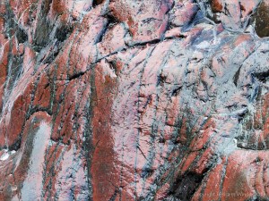 Close-up image red serpentine rock