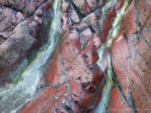 Close-up image red serpentine rock