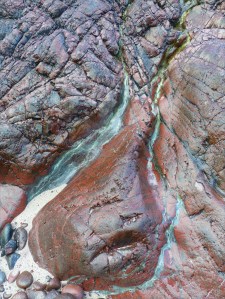 Close-up image red serpentine rock