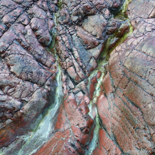Close-up image red serpentine rock
