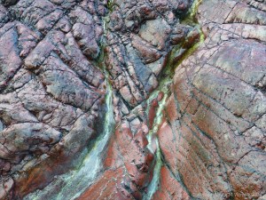 Close-up image red serpentine rock