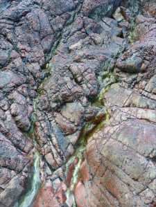 Close-up image red serpentine rock
