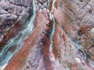 Close-up image red serpentine rock