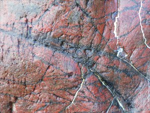 Close-up image red serpentine rock