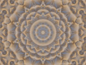 Mandala pattern with sand