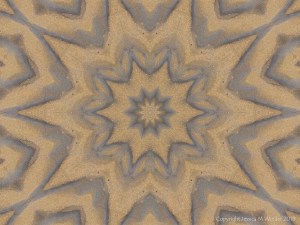 Mandala pattern with sand