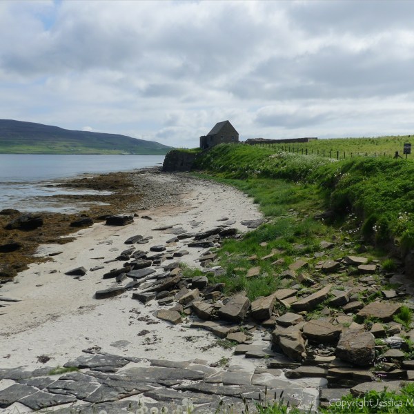 Looking east from Point of Hellia in Orkney towards Broch of Gurness and visitor centre