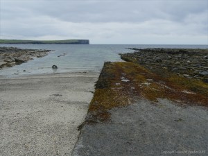 Seaweed-covered slipway at Birsay