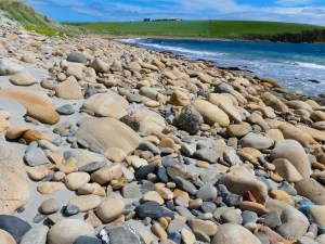 Beach stones at the west end of Dingieshowe Bay