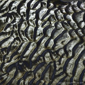 Wet sand ripple natural pattern