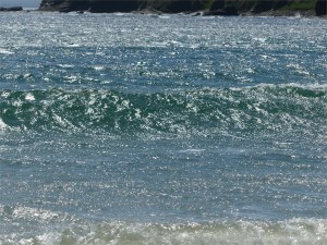 Sunshine on blue sea at Newark Bay