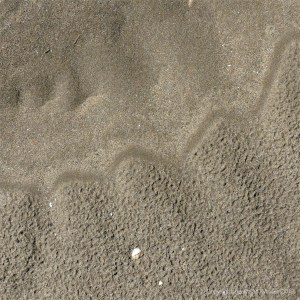 Sand texture and pattern on the beach