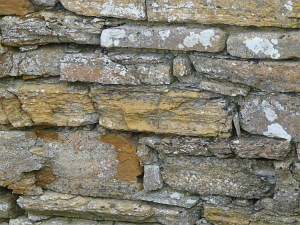 Texture and pattern in Devonian sedimentary rocks used for building stone walls on a over 2000 years ago