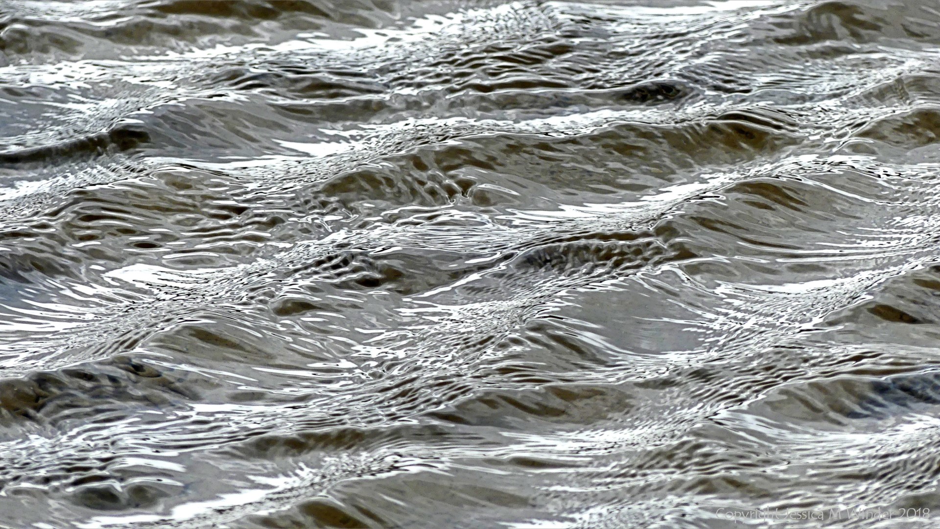 Natural river water surface texture and pattern