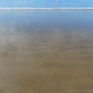 The sandy beach at low tide on Rhossili Bay