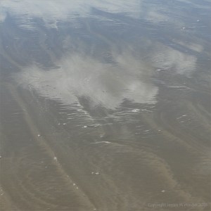 The sandy beach at low tide on Rhossili Bay
