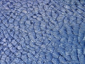 Natural patterns of light reflected on water