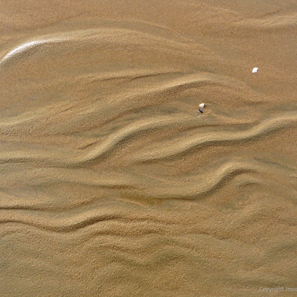 Natural sand texture and pattern on the beach