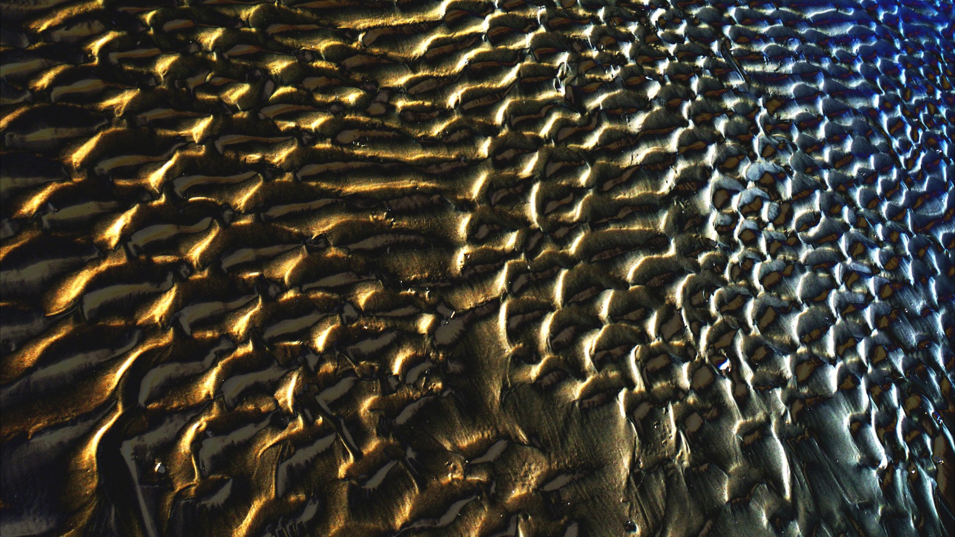 Abstract enhanced photograph of sand ripple patterns
