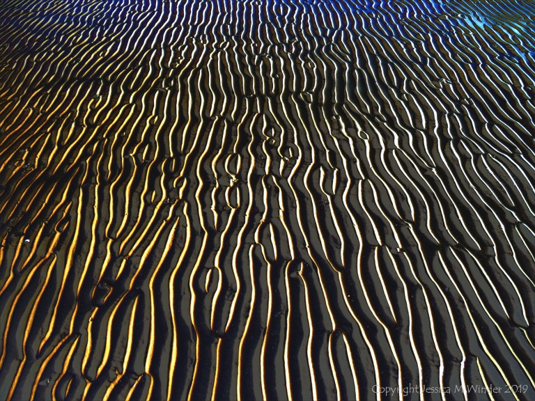 Abstract enhanced photograph of sand ripple patterns