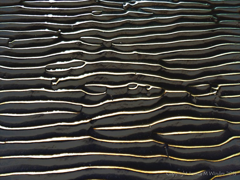 Abstract enhanced photograph of sand ripple patterns