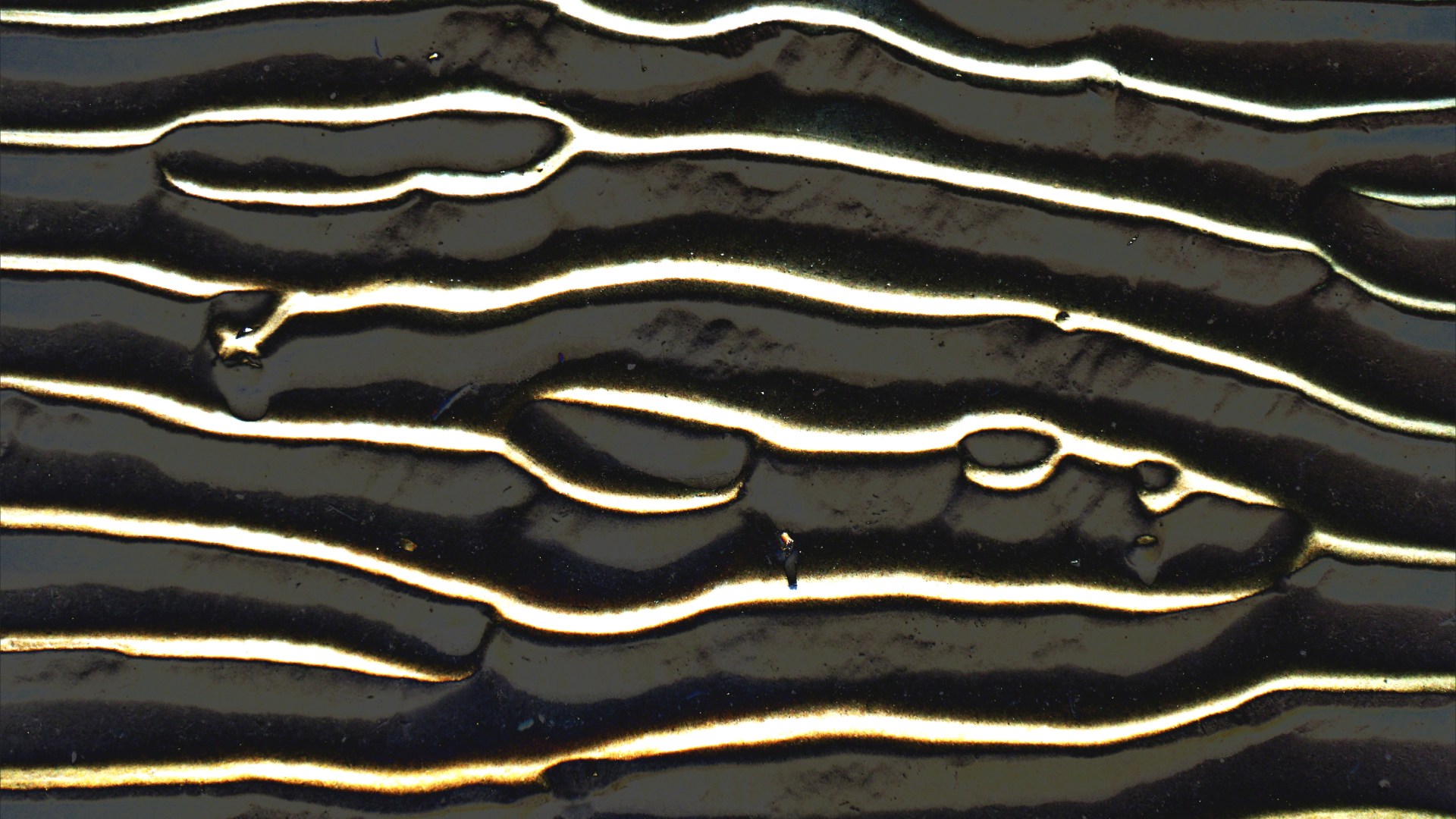 Abstract enhanced photograph of sand ripple patterns