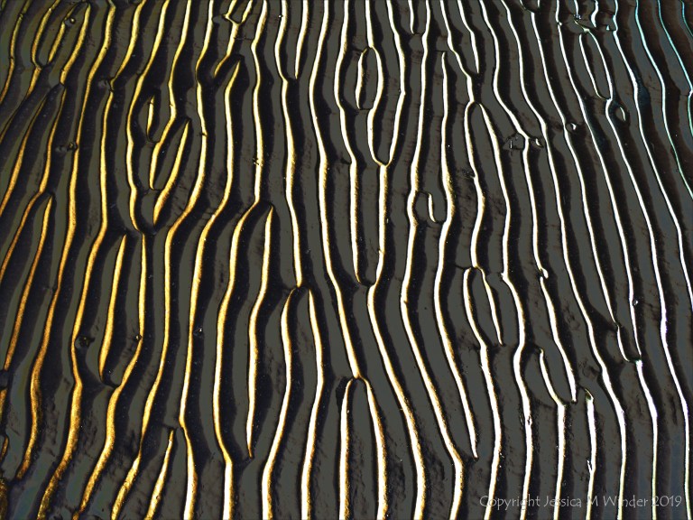 Abstract enhanced photograph of sand ripple patterns