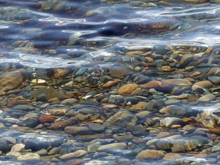Shallow water on the beach at Crystal Cliffs in Nova Scotia