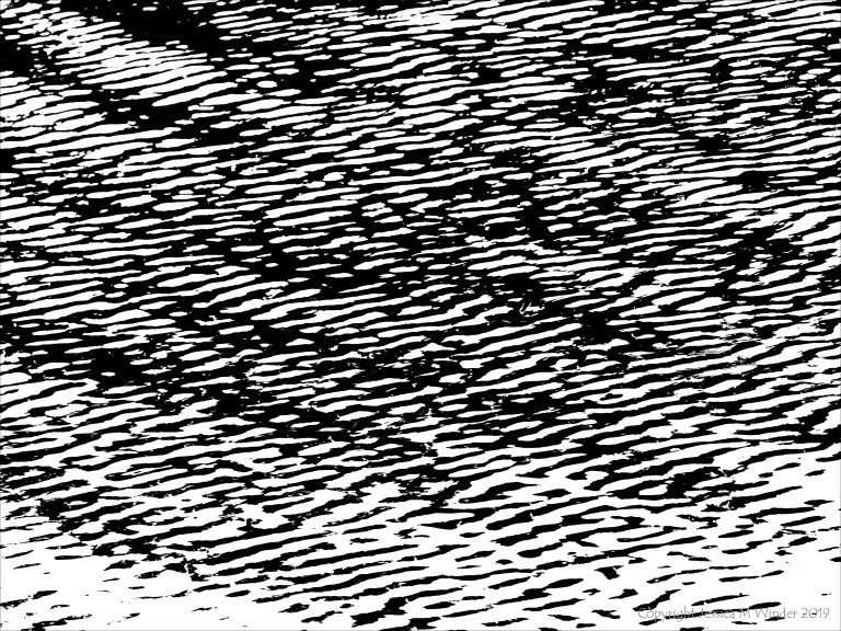Natural water ripple patterns in black and white
