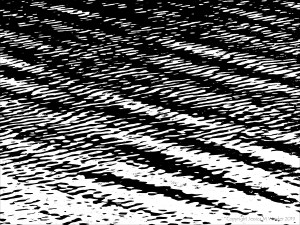 Natural water ripple patterns in black and white