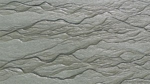 Natural patterns in the sand on a beach as the tide goes out