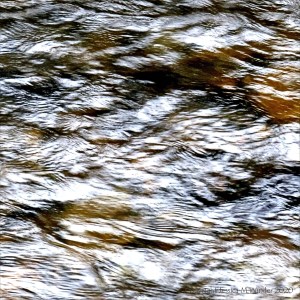 Fast water flowing in the Afon Llwyd